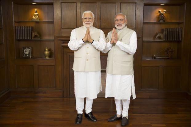 Narendra Modi’s wax statue is dressed in his trademark cream-coloured chooridar kurta and sleeveless jacket, and strikes a namaste pose. Photo: Madame Tussauds - Mango News Narendra Modi’s wax statue is dressed in his trademark cream-coloured chooridar kurta and sleeveless jacket, and strikes a namaste pose. Photo: Madame Tussauds - Mango News