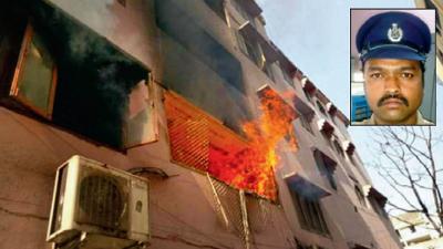 Inset picture of the constable Bheem Rao who saved 20 people from fire in Hyderabad.