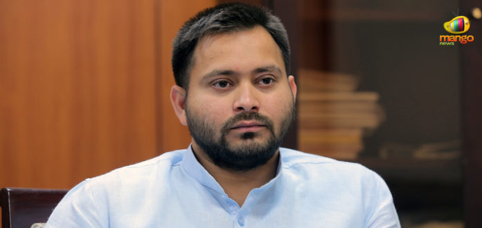 Lok Sabha Elections – Tejashwi Yadav Criticises Giriraj Singh Lok Sabha Elections – Tejashwi Yadav Criticises Giriraj Singh, Tejashwi takes on Giriraj , Patna latest news, RJD Tejashwi Yadav latest news, Tejashwi Yadav and Giriraj Singh, Bihar Lok Sabha elections, Tejashwi Yadav Ban green remark, green flags banned in India, Lok Sabha election live updates, Mango News, #Elections2019