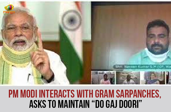 PM-Modi-Interacts-With-Gram-Sarpanches,-Asks-To-Maintain-“Do-Gaj-Doori” National Panchayati Raj Day, Panchayati Raj Day, panchayati raj day 2020, PM Modi, PM Modi Interacts with Sarpanches, PM Modi Interacts with Sarpanches Through Video-conference, PM Modi Interacts with Village Sarpanchs, PM Modi on Panchayati Raj Day, PM Modi Video conference with Sarpanches, PM Narendra Modi, Prime Minister Narendra Modi