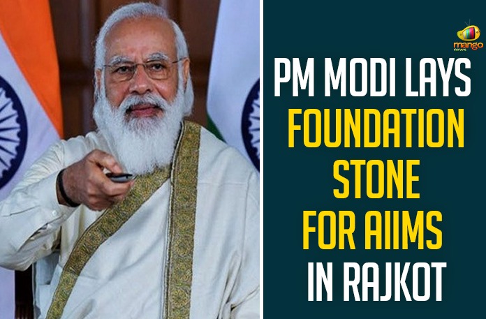 PM Modi Lays Foundation Stone For AIIMS In Rajkot PM Modi Lays Foundation Stone For AIIMS In Rajkot,Narendra modi,modi,prime minister of india,pmo india,pmo,pm narendra modi,pm modi,pm modi speech,pm narendra modi speech,pm modi speech today,namo,pm of india,pm narendra modi speech latest,pm modi speech latest,pm modi latest speech,modi speech,india,modi speech today,modi live,prime minister narendra modi,All India Institute of Medical Sciences,video conferencing,Naturopathy,Homoeopathy,AIIMS,Rajkot,Gujarat,health care,Mango News