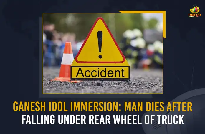 Ganesh Idol Immersion Ganesh Idol Immersion Man Dies After Falling Under Rear Wheel Of Truck, Man Dies After Falling Under Rear Wheel Of Truck, Ganesh Idol Immersion, a man fell down from the vehicle while returning home after immersing a Ganesh idol, Hyderabad Man Crushed To Death, Ganesha processions, tragic incident In Telangana, Ganesh Immersion, Telangana Ganesh Immersion, Rear Wheel Of Truck, Ganesh Idol Immersion News, Ganesh Idol Immersion Latest News And Updates, Ganesh Idol Immersion Live Update, Mango News,