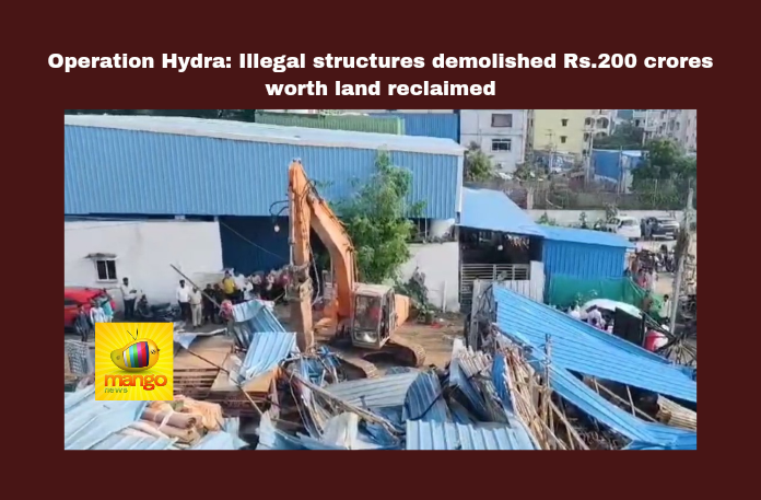 Illegal Structures Demolished in Hyderabad’s Kukatpally and Patancheru; ₹200 Crore Worth of Government Land Reclaimed Illegal Structures Demolished in Hyderabad’s Kukatpally and Patancheru; ₹200 Crore Worth of Government Land Reclaimed, Hyderabad demolitions, illegal constructions, Kukatpally Nallacheruvu, government land reclamation, Hydra officials, Telangana urban development, Aminpur demolitions, Patancheru illegal structures, urban land value, property demolition, Telangana, TS Live Updates, TS Political News, Political News, Mango News