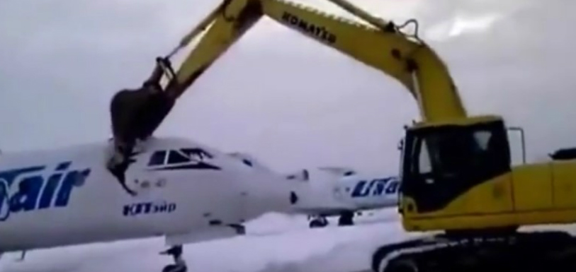 Watch: An angry ex-employee destroys aeroplane with digger - Mango News