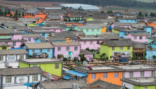 In Pictures: China Village walls painted in 3D attract tourist 