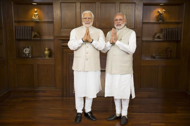 Narendra Modi’s wax statue is dressed in his trademark cream-coloured chooridar kurta and sleeveless jacket, and strikes a namaste pose. Photo: Madame Tussauds - Mango News