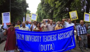 The Delhi University Teachers Association protest the passing of amendment that would affect the work of ad-hoc teachers