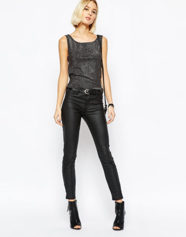 A monochrome black metallic top with some leather pants, and you are all set to go!