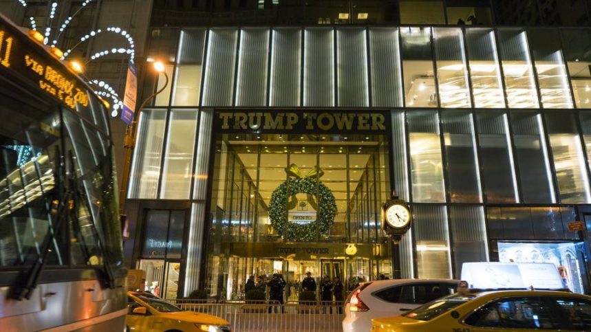 Vehicles pass by Trump Tower on Fifth Avenue in New York, Tuesday. The New York Police Department evacuated the lobby of Trump Tower on Tuesday to investigate an unattended backpack, only to find that the bag contained children's toys.