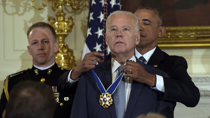 US President Obama honoring the Vice President Joseph Biden with Presidential Medal of Freedom with distinction. 