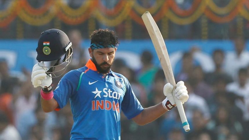 Yuvraj Singh celebrates his century in the second One-Day International game against England in Cuttack on Thursday.
