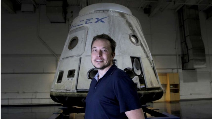 Elon Musk in front of Dragon spacecraft SpaceX