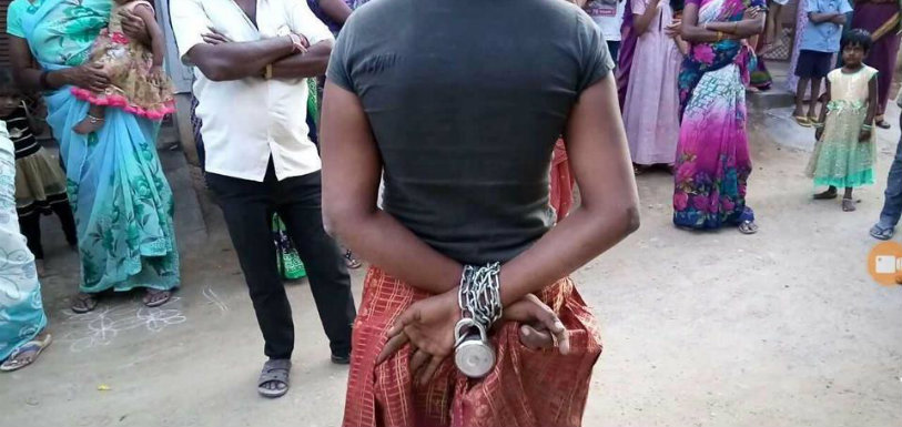 22 Year Old Woman Chained By Family In Telangana,Mango News,Telangana Breaking News,Telangana Woman Chained,Woman Hands chained in Jagtial town in Telangana,Family chains Telangana woman,Tied my hands with iron chain,Mentally Woman chained
