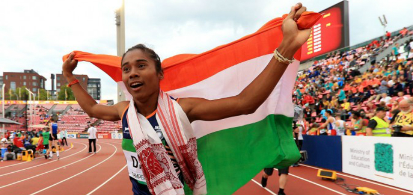 India Wins First Gold: Hima Das Makes History, #Himadas, Hima Das Wins India's First Gold, athletics India, Sports News Latest, 18-Year-Old Hima Das Made History, World Junior Athletics Winner, Himadas First Indian woman to win #IAAFworlds title, India celebrates Hima Das' historic gold medal, India News Headlines, Mango News, Breaking News Today