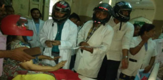Osmania Hospital’s Doctors Wear Helmets, OGH roofs crumbling doctors treat patients in the open, Doctors at Osmania Hospital wore helmets, Mango News, Osmania Government Hospital Latest News, Osmania Hospital Staff And Patients Wearing Helmets, Hyderabad Osmania General Hospital roof falls, Osmania Hospital reconstruction