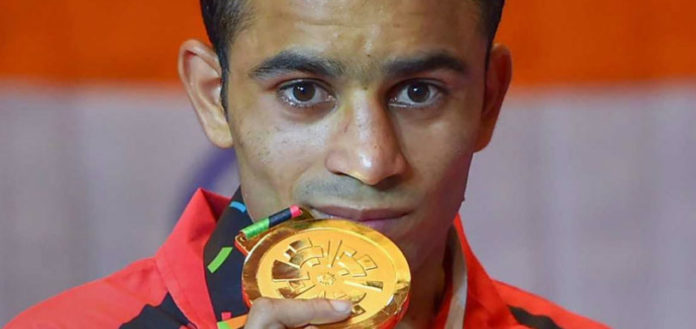 Asian Games 2018: Amit Panghal Wins Boxing Gold, Asian Games 2018 Day 14 Latest News and Updates, ​Amit Panghal clinches India's first boxing gold, 14 Indian Gold Medal Winners at Asian Games, Mango News, Men's Hockey Match India vs Pakistan Latest News, Amit Panghal Beats Olympic Champion Hasanboy Dusmatov, Asian Games 2018, Latest Sports News India Headlines Today
