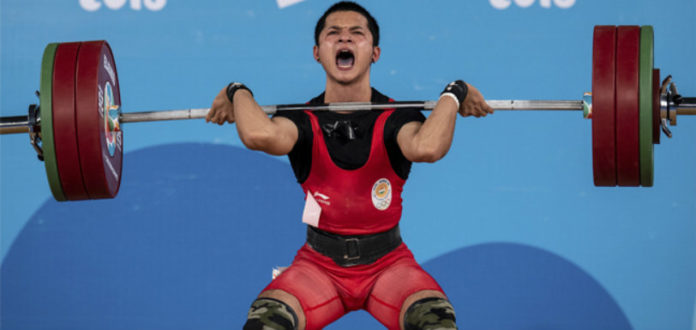 Weightlifter Jeremy Bags Gold In Summer Youth Olympics, Jeremy Lalrinnunga wins India's maiden gold medal, India won First gold medal at Youth Olympic Games, Weightlifter Jeremy Lalrinnunga gold medal, India Medals weightlifting 2018, Youth Olympic Games 2018, India Medals at Youth Olympics, Mango News, Jeremy Lalrinnunga Latest News and Updates