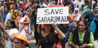 Sabarimala Temple- Protests Against Women Entering Temple, Protesters Stop Women at Sabarimala Base Camp, BJP holds protests against women's entry in Sabarimala, Massive Protest Against Sabarimala Verdict, Mango News, Sabarimala row Latest updates, Women Entry Ayyappa Temple Controversy,