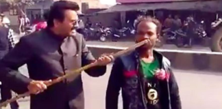 Uttar Pradesh – BJP Leader Assaults Specially Abled Man, BJP leader beats specially abled man, Mango News, BJP leader misbehaviour in UP, specially abled man criticize BJP, Akhilesh Yadav Samajwadi Party latest news, case registered against BJP leader, Mohammad Miya abusing man, BJP leader attacking disabled man in UP