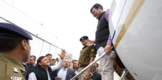 SP Chief Akhilesh Yadav Detained At Lucknow Airport,Mango News,Breaking News Today,Akhilesh Yadav Stopped At Lucknow Airport,Protests in Lucknow Airport,Akhilesh Yadav Plane Stopped at Lucknow,Lucknow Airport Latest News,Samajwadi Party Chatra Sabha