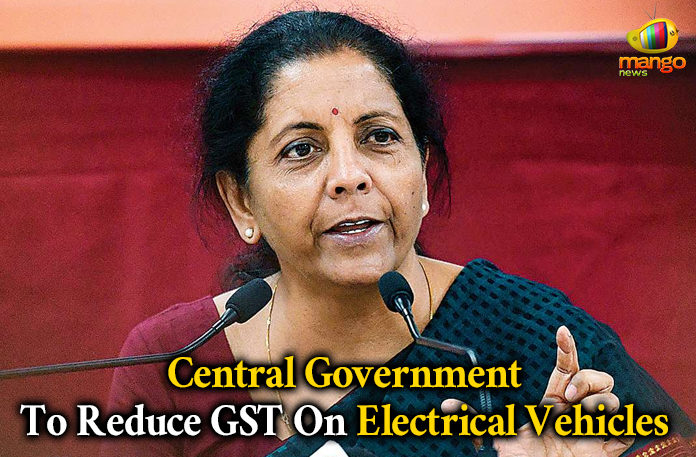 Mango News,Central Government To Reduce GST On Electrical Vehicles, GST Council reduces rate on electric vehicles from 12% to 5%, Industry body welcomes govt move to cut GST on Electric Vehicles, GST Council Reduces Tax on Electric Cars and EV Chargers to 5 Percent, GST Council slashes tax rates on electric vehicles,GST Tax Reduced On Electric Vehicles