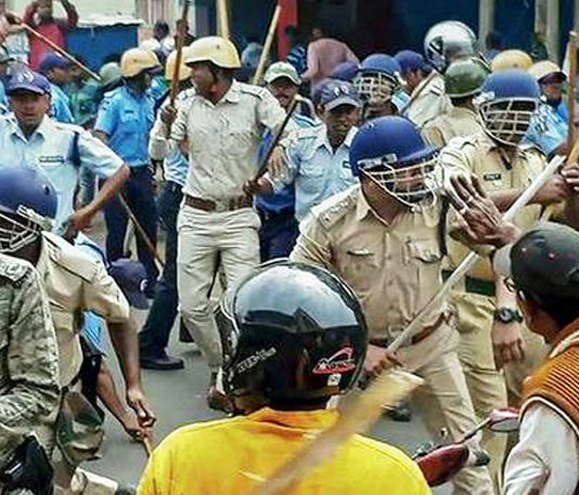 West Bengal Police Arrests 13 BJP Workers, BJP workers clashes with TMC workers, TMC BJP Clashes, BJP workers attacked Police, Mango News, BJP workers police clash in West Bengal, West Bengal latest news and updates, BJP Party West Bengal news