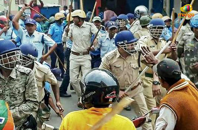 West Bengal Police Arrests 13 BJP Workers, BJP workers clashes with TMC workers, TMC BJP Clashes, BJP workers attacked Police, Mango News, BJP workers police clash in West Bengal, West Bengal latest news and updates, BJP Party West Bengal news