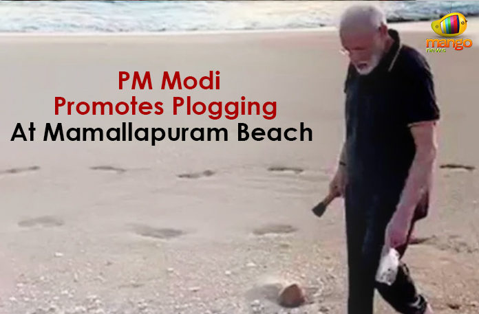 Latest Political Breaking News, Mango News, Modi Uses Plogging To Pick Trash At Mamallapuram Beach, National News Headlines Today, national news updates 2019, National Political News 2019, PM Modi Uses Plogging To Pick Trash At Mamallapuram, PM Modi Uses Plogging To Pick Trash At Mamallapuram Beach