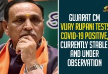 Day After Fainting at Vadodara Rally Gujarat Chief Minister Vijay Rupani Tests Positive for Covid-19, Day after fainting mid-speech Gujarat CM Vijay Rupani tests positive for Covid-19, Gujarat Chief Minister Vijay Rupani tests positive for coronavirus, Gujarat Chief Minister Vijay Rupani tests positive for COVID, Gujarat Chief Minister Vijay Rupani Tests Positive for Covid-19, Gujarat CM tests positive for Covid day after he collapses on stage, Gujarat CM Vijay Rupani tests positive for Covid-19, Gujarat CM Vijay Rupani tests positive for COVID-19 admitted to hospital, Mango News,