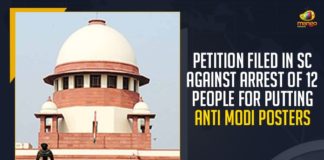 Petition Filed In SC Against Arrest Of People For Putting Anti Modi Posters, Mango News, Latest Breaking News 2021,Anti Modi Posters, People Putting Anti PM Modi Posters, Central Government COVID-19 Vaccination Policy, Posters Slamming Modi Vaccine, Modi posters, Narendra Modi posters, Prime Minister Modi, Wuhan virus, COVAX, 12 Arrested Over Posters Against PM Modi