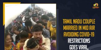 Couple get married mid-air on flight to avoid restrictions, DGCA Orders Probe, Indian couple holds mid-air wedding, Madurai Couple Gets Married In Plane, Madurai Couple Gets Married Mid-air in Flight, Madurai Couple Gets Married on Plane, Madurai couple’s mid-air wedding flouts Covid-19 norms, Mango News, Tamil Nadu Couple Married In Mid Air Avoiding COVID-19 Restrictions, Tamil Nadu Couple Married In Mid Air Avoiding COVID-19 Restrictions Goes Viral, viral video