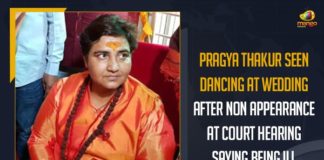 BJP MP Pragya Thakur seen dancing at Bhopal wedding, BJP MP Pragya Thakur seen dancing at wedding, BJP’s Pragya Thakur too ill to appear in court, dance video of MP Pragya Thakur, dance video of MP Pragya Thakur went viral, Mango News, Pragya Thakur, Pragya Thakur Seen Dancing, Pragya Thakur Seen Dancing At Wedding, Pragya Thakur Seen Dancing At Wedding After Non Appearance At Court Hearing Saying Being Ill