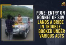 Pune: Entry On Bonnet Of SUV Lands A Bride In Trouble, Booked Under Various Acts Bride Charged For Travelling To Wedding Venue On Bonnet, Bride goes to marriage ceremony on SUV bonnet, Bride sits on car bonnet for her entry, Central Government, COVID-19 protocol, Entry On Bonnet Of SUV Lands A Bride In Trouble, Mango News, Maskless Bride Rides to Wedding Venue on Bonnet, PM Narendra Modi, Pune, Pune Bride Booked After Video Of Her Riding To Wedding, Violating COVID Protocols