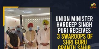 3 Swaroops Of Shri Guru Granth Sahib From Kabul, Hardeep Singh Puri Receives 3 Copies Of Guru Granth Sahib, Hardeep Singh Puri Receives 3 Swaroops Of Shri Guru Granth Sahib, HS Puri Carries Swaroop of Sri Guru Granth Sahib, Mango News, Minister Receives Guru Granth Sahib At Delhi Airport, Union Minister Hardeep Singh Puri, Union Minister Hardeep Singh Puri Receives 3 Swaroops Of Shri Guru Granth Sahib, Union Minister Hardeep Singh Puri Receives 3 Swaroops Of Shri Guru Granth Sahib From Kabul, Union ministers receive Guru Granth Sahib from Kabul, Union Ministers to receive three copies of Guru Granth Sahib