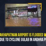 Cyclone Gulab, Cyclone Gulab Effect, Cyclone Gulab In Andhra Pradesh, Cyclone Gulab landfall, Cyclone Gulab landfall hits Visakhapatnam airport, Heavy rains flood low lying areas, Mango News, Visakhapatnam airport almost submerged as Cyclone Gulab, Visakhapatnam airport almost submerged as Cyclone Gulab triggers heavy rain, Visakhapatnam Airport Is Flooded With Water, Visakhapatnam Airport Is Flooded With Water Due To Cyclone Gulab In Andhra Pradesh, Vizag Airport Flooded