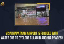 Visakhapatnam Airport Is Flooded With Water Due To Cyclone Gulab In Andhra Pradesh Cyclone Gulab, Cyclone Gulab Effect, Cyclone Gulab In Andhra Pradesh, Cyclone Gulab landfall, Cyclone Gulab landfall hits Visakhapatnam airport, Heavy rains flood low lying areas, Mango News, Visakhapatnam airport almost submerged as Cyclone Gulab, Visakhapatnam airport almost submerged as Cyclone Gulab triggers heavy rain, Visakhapatnam Airport Is Flooded With Water, Visakhapatnam Airport Is Flooded With Water Due To Cyclone Gulab In Andhra Pradesh, Vizag Airport Flooded