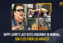 Bappi Lahri’s Last Rites Underway In Mumbai, Son Flies From Los Angeles Bappi Lahri's Last Rites Underway In Mumbai Son Flies From Los Angeles, Son Flies From Los Angeles, funeral ceremony of Bappi Lahri are underway at Pawan Hans Crematorium, Bappi Lahri's Last Rites Underway In Mumbai, Veteran Singer-Composer Passes Away At 69, Bappi Lahiri, Bappi Lahiri The Veteran Singer-Composer Passes Away, Bappi Lahiri The Veteran Singer-Composer, Music composer and singer Bappi Lahiri, Music composer, singer, singer Bappi Lahiri, Music composer Bappi Lahiri, disco music in India, disco music, Veteran Singer, Veteran Singer Bappi Lahiri, Bappi Lahiri Passes Away At 69, Mango News, The last rites of the legendary music composer and singer Bappi Lahiri, legendary music composer and singer Bappi Lahiri, legendary music composer Bappi Lahiri, legendary singer Bappi Lahiri,