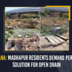 Telangana Madhapur Residents Demand Permanent Solution For Open Drain, Madhapur Residents Demand Permanent Solution For Open Drain, Permanent Solution For Open Drain, Open Drain Permanent Solution, Ridhima resident of Madhapur have demanded GHMC to provide the residents a permanent closure For Open Drain, Open Drain, permanent closure For Open Drain, Greater Hyderabad Municipal Corporation, residents of Madhapur have started raising their civic issues To GHMC that can cause several difficulties to them, Madhapur Residents, Ridhima G has demanded the GHMC provide the residents a permanent closure of open drains that have been open for months, Open Drains In Madhapur, Open Drains In Madhapur News, Open Drains In Madhapur Latest News, Open Drains In Madhapur Latest Updates, Mango News,