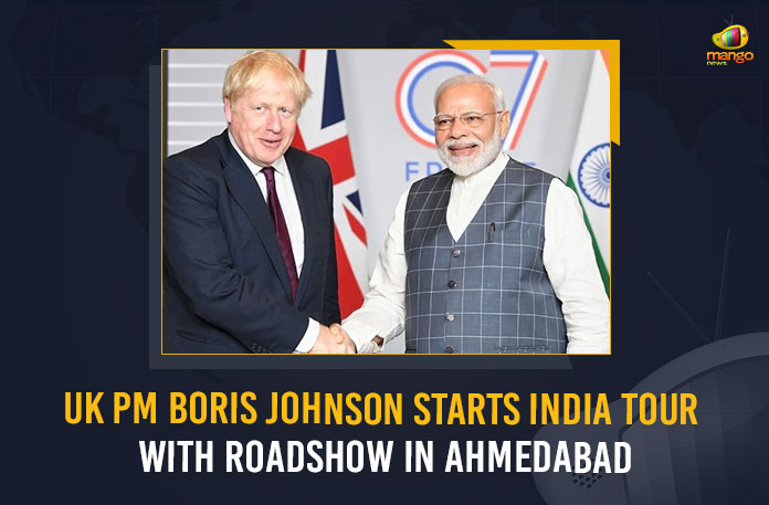 UK-PM-Boris-Johnson-Starts-India-Tour-With-Roadshow-In-Ahmedabad UK PM Boris Johnson Starts India Tour With Roadshow In Ahmedabad, Boris Johnson India visit, PM Boris Johnson Starts India Tour With Roadshow In Ahmedabad, UK PM Boris Johnson to begin two-day India trip, UK PM Boris Johnson Starts India Tour, Boris Johnson would visit Ahmedabad with a roadshow On the first day of the tour, UK PM Boris Johnson two-day Tour In India, British Prime Minister Boris Johnson arrived in Ahmedabad on Thursday morning to start his India visit, British Prime Minister Boris Johnson, British Prime Minister, Prime Minister Boris Johnson, Prime Minister Boris Johnson Tour To India, Prime Minister Boris Johnson 2 Days Tour To India, Boris Johnson India visit News, Boris Johnson India visit Latest News, Boris Johnson India visit Latest Updates, Boris Johnson India visit Live Updates, Mango News,