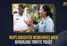 MLA's Daughter Misbehaves With Bengaluru Traffic Police, VIP display in Bengaluru, Bengaluru Traffic Police, BJP MLA daughter misbehaves with Bengaluru Traffic Cops, Bengaluru Traffic Cops, BJP MLA daughter Misbehaves With Bengaluru Traffic Police, Karnataka BJP MLA's daughter jumps signal, Karnataka BJP MLA's daughter misbehaves with traffic cops, BJP MLA Aravind Limbavali daughter misbehaves with traffic cops, BJP MLA Aravind Limbavali daughter, MLA Aravind Limbavali daughter, BJP MLA Aravind Limbavali, Aravind Limbavali, BJP MLA, Renuka Limbavali, Mango News,