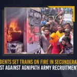 Students Set Trains On Fire In Secunderabad To Protest Against Agnipath Army Recruitment Scheme, Students Set Trains On Fire In Secunderabad, Trains On Fire In Secunderabad, Protest Against Agnipath Army Recruitment Scheme, Agnipath Army Recruitment Scheme, National Students Union of India activists staged a violent protest at Secunderabad Railway Station, NSUI activists staged a violent protest at Secunderabad Railway Station, violent protest at Secunderabad Railway Station, Secunderabad Railway Station, Agnipath Protests Live Updates, Agnipath Issue,Agnipath Protests, Agnipath protests in Telangana, Agnipath Scheme, Agnipath Scheme Updates, Agnipath, Agnipath Protests Highlights, #AgnipathScheme, #AgnipathRecruitmentScheme, #AgnipathSchemeProtest, #Agnipath, Agnipath Army Recruitment Scheme News, Agnipath Army Recruitment Scheme Latest News, Agnipath Army Recruitment Scheme Latest Updates, Agnipath Army Recruitment Scheme Live Updates, Mango News,