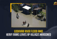 Godavari River Flood Amid Heavy Rains Leaves AP Villages Marooned, Heavy Rains Leaves AP Villages Marooned, AP Villages Marooned, Sir Arthur Cotton Barrage at Dowaleswaram near Rajamahendravaram crossed the 24 lakh cusecs mark on the 16th of July, Sir Arthur Cotton Barrage crossed the 24 lakh cusecs mark on the 16th of July, 24 lakh cusecs mark, Sir Arthur Cotton Barrage at Dowaleswaram near Rajamahendravaram, Sir Arthur Cotton Barrage at Dowaleswaram, Rajamahendravaram, Sir Arthur Cotton Barrage, 177 villages lay marooned confirmed to the State Disaster Management Authority, State Disaster Management Authority, worst hit was Konaseema district where 36 Lanka villages were totally inundated, Heavy Rains In AP, Godavari River Flood News, Godavari River Flood Latest News, Godavari River Flood Latest Updates, Godavari River Flood Live Updates, Mango News,