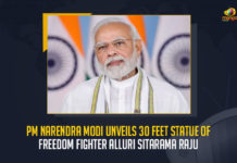 PM Narendra Modi Unveils 30 Feet Statue Of Freedom Fighter Alluri Sitarama Raju, PM Narendra Modi Unveils Virtually 30 Feet Alluri Sitarama Raju Statue at Bhimavaram AP, Narendra Modi Unveils Virtually 30 Feet Alluri Sitarama Raju Statue at Bhimavaram AP, Modi Unveils Virtually 30 Feet Alluri Sitarama Raju Statue at Bhimavaram AP, PM Modi Unveils Virtually 30 Feet Alluri Sitarama Raju Statue at Bhimavaram AP, 30 Feet Alluri Sitarama Raju Statue at Bhimavaram AP, Bhimavaram 30 Feet Alluri Sitarama Raju Statue, 30 Feet Alluri Sitarama Raju Statue, Alluri Sitarama Raju Statue, Prime Minister Narendra Modi virtually unveiled a 30-feet bronze statue of Tribal hero Alluri Sitaramaraju at Bhimavaram AP, 30-feet bronze statue of Tribal hero Alluri Sitaramaraju, Tribal hero Alluri Sitaramaraju, 30-feet bronze statue, Alluri Sitaramaraju, PM Modi Bhimavaram Tour News, PM Modi Bhimavaram Tour Latest News, PM Modi Bhimavaram Tour Latest Updates, PM Modi Bhimavaram Tour Live Updates, PM Narendra Modi, Narendra Modi, Prime Minister Narendra Modi, Prime Minister Of India, Narendra Modi Prime Minister Of India, Prime Minister Of India Narendra Modi, Mango News,