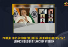 PM Modi Hails Achinta Sheuli For Gold Medal At CWG 2022 Shares Video Of Interaction With Him, Achinta Sheuli For Gold Medal At CWG 2022, PM Modi Hails Achinta Sheuli For Gold Medal At CWG 2022, PM Modi Shares Video Of Interaction With Achinta Sheuli, Achinta Sheuli Won Gold Medals in Weightlifting, Gold Medal in Weightlifting, Weightlifter Achinta Sheuli, Gold Medal in Commonwealth Games-2022, Birmingham Commonwealth Games 2022, 2022 Birmingham Commonwealth Games, Birmingham Commonwealth Games, Commonwealth Games, Birmingham Alexander Stadium, Commonwealth Games 2022 sports, Birmingham Commonwealth Games 2022 News, Birmingham Commonwealth Games 2022 Latest News, Birmingham Commonwealth Games 2022 Latest Updates, Birmingham Commonwealth Games 2022 Live Updates, Mango News,