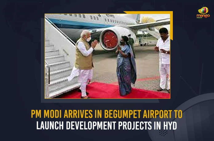 PM Modi Arrives In Begumpet Airport To Launch Development Projects In Hyd PM Modi Arrives In Begumpet Airport To Launch Development Projects In Hyd, PM Modi Addressed in Public Meeting at Begumpet Airport, PM Modi at Begumpet Airport, PM Modi Reaches Hyderabad, Development Projects In Hyd, Begumpet Airport Public Meeting, PM Modi Telangana Tour Schedule, PM Modi Telangana Tour, PM Modi at Telangana, PM Modi Telangana Visit, PM Modi in Telangana, Prime Minister Narendra Modi, Narendra Modi, Begumpet Airport, PM Narendra Modi in Telangana, PM Modi Telangana Tour News, PM Modi Telangana Tour Latest News And Updates, PM Modi Telangana Tour Live Updates, Mango News