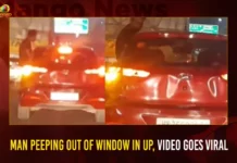 Man Peeping Out of Window In UP Video Goes Viral,Man Peeping Out of Window In UP,UP Video Goes Viral,Man Peeping Out Video Goes Viral,Mango News,Man Seen Peeping Out Window,Man caught on camera peeping,Man Seen Peeping Out Window On Busy UP Roads,UP Video Goes Viral Latest News,man peeping through window Latest News,man peeking out window News Today,UP Video Goes Viral Latest Updates,Uttar Pradesh Traffic Police,Uttar Pradesh Latest News,Uttar Pradesh Viral Video,Uttar Pradesh News Today
