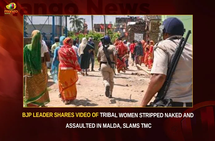 BJP Leader Shares Video Of Tribal Women Stripped Naked And Assaulted In Malda Slams TMC,BJP Leader Shares Video Of Tribal Women,Tribal Women Stripped Naked And Assaulted,Assaulted In Malda Slams TMC,Mango News,Amit Malviya Shares Video Of Two Tribal Women,2 women allegedly stripped,BJP Slams TMC,Manipur Sexual Assault,Manipur Violence Latest News,Manipur Violence Latest Updates,NCW Chairperson Latest News,Manipur Violence Uproar,PM Modi Speaks On Manipur Horror,Manipur incident can never be forgiven,Manipur Violence Live News