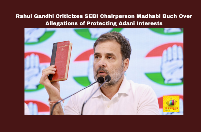 Rahul Gandhi Criticizes SEBI Chairperson Madhabi Buch Over Allegations of Protecting Adani Interests Rahul Gandhi Criticizes SEBI Chairperson Madhabi Buch Over Allegations of Protecting Adani Interests, Rahul Gandhi, SEBI, Madhabi Buch, Adani Group, small investors, stock market, Modi government, hedge investors, accountability, financial irregularities, India, National News, Internationational News, Mango News